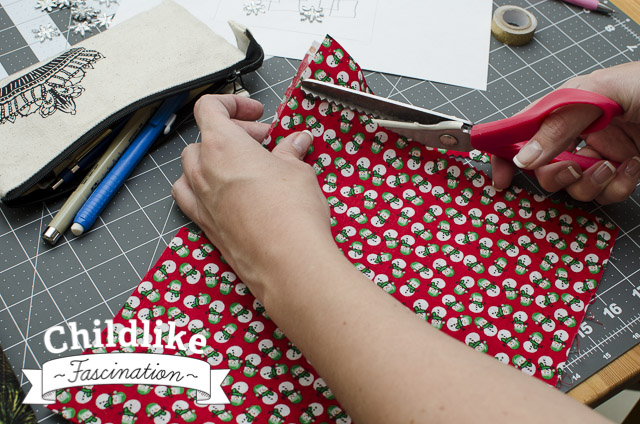 Trim cut edge with pinking shears