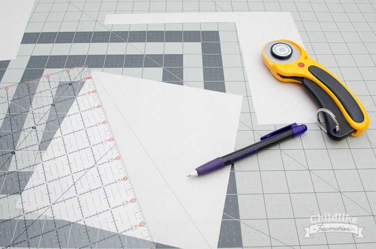 Cut paper 7 1/5" and draw a line diagonally to make the String Showcase block